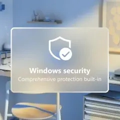 Jasne, oto opis alternatywny:

Biurko z komputerem i grafiką "Windows security". Chcesz wiedzieć, jak wyłączyć Windows Defender?